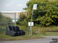 A typical STO bus stop and sign