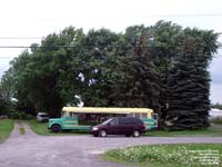 Old school bus recycled in a fruits and veggies stand in Valleyfield,QC