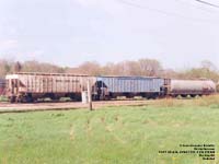 CSX Transportation - CSXT 251414, GE Rail Services (Peavey Co.) - PVGX 1151 and Canadian Natioanl - CN 379248