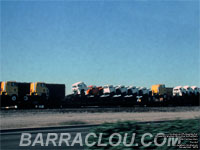 Trucks on flat cars