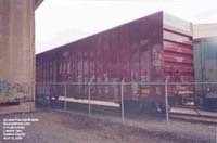 Canadian National hi-cube boxcar with graffiti