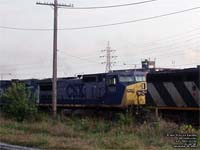 CSXT 7661 (with CN 2407 & IC 2461) - Dash 8-40CW