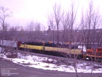 SLR train 394 follows St.Francis River in Lennoxville.