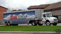 Molson Breweries tractor with a Coors Light trailer