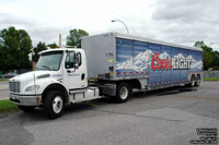 Molson Breweries tractor with a Coors Light trailer