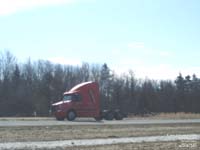 A red Volvo tractor