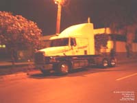 A mexican White-GMC tractor stays over Brownsville,TX